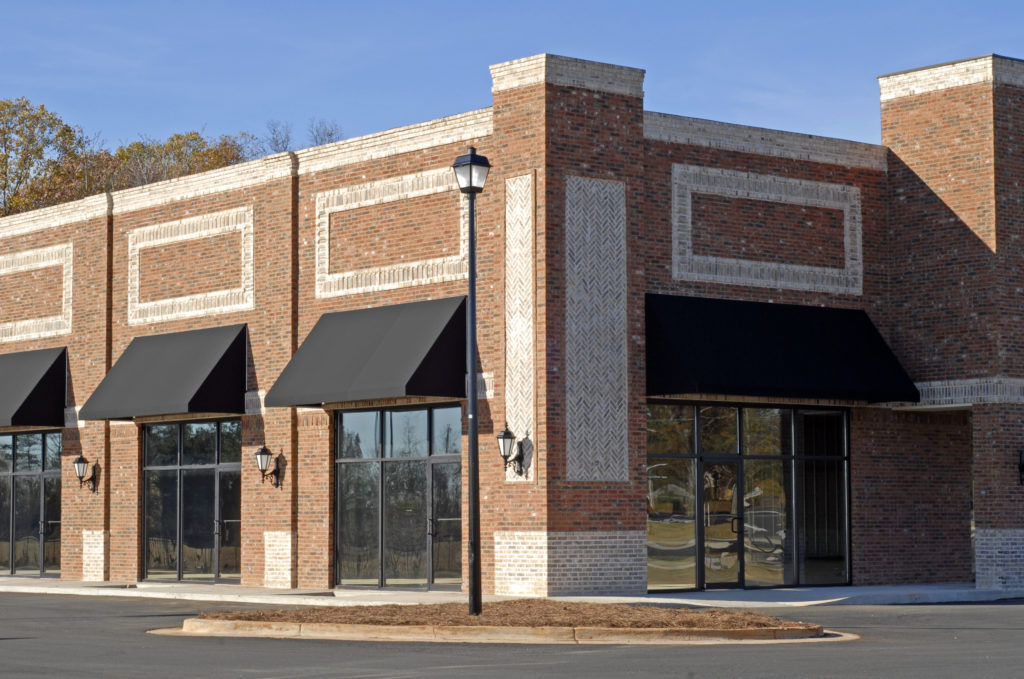 Facade of a New Commercial Building with Retail and Office Space for Lease